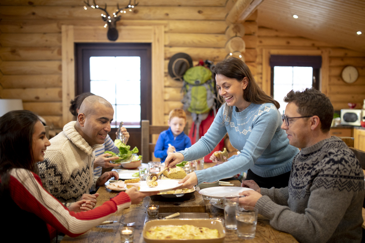 Serving Dinner to her Family